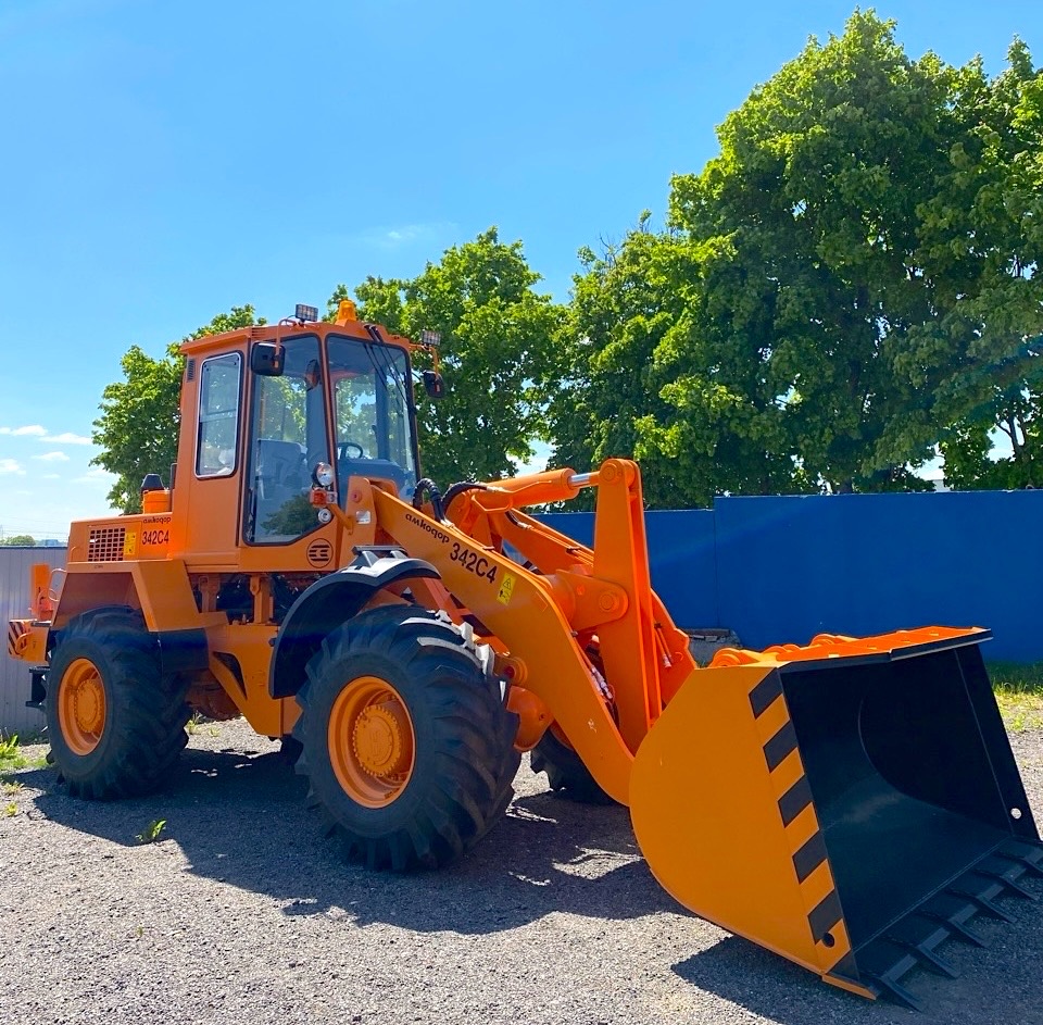 Лизинг спецтехники фронтальный погрузчик амкодор с гарантией в беларуси